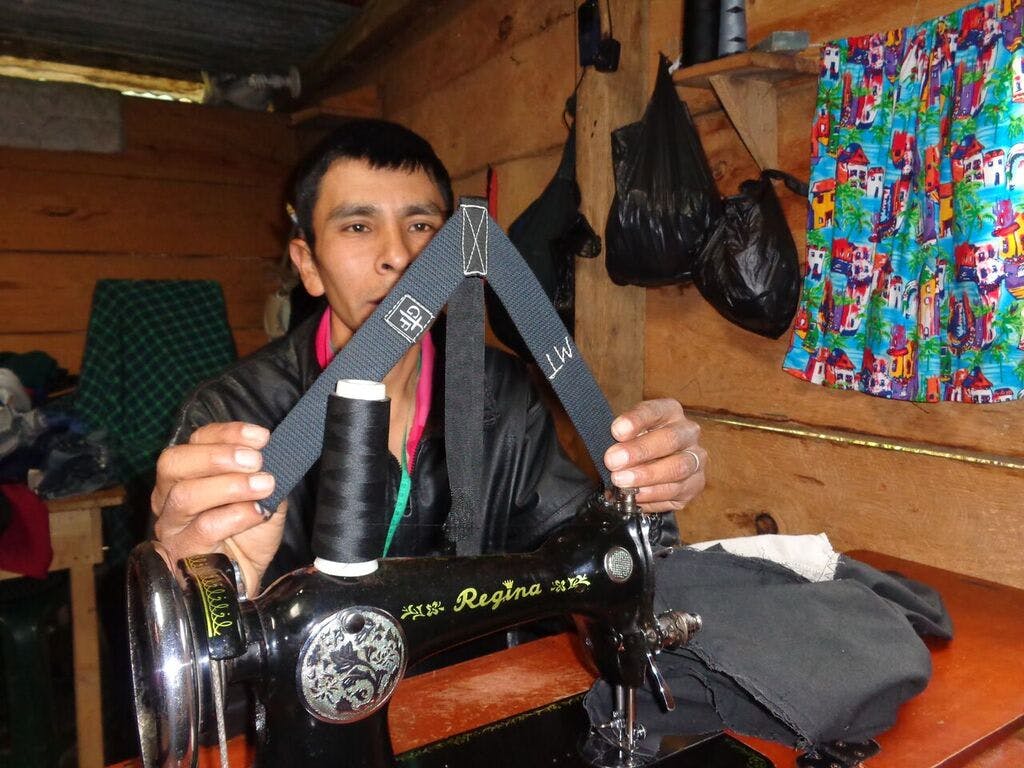 Marcelino Tun is using his sewing machine for ending poverty