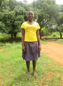 Sponsored child and orphan Alice was given a goat to care for and raise during a livestock distribution. Now, she has seven goats and has been able to pay for her education, school uniforms, shoes, books and pens.