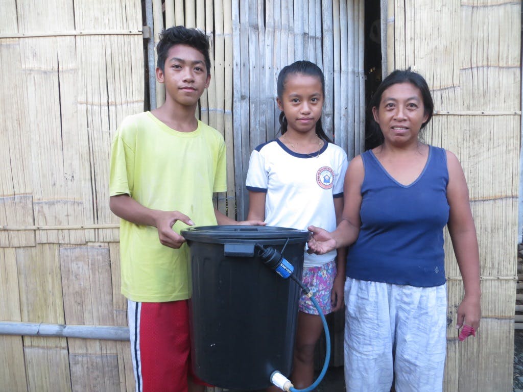 This family now has clean water because of a filtration system.