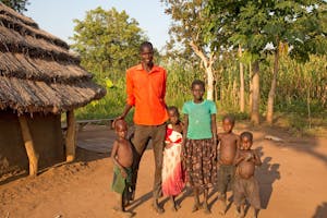 Uganda farmer and his family