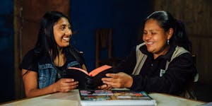 Reading a Bible in Peru
