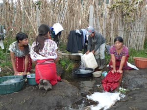 Women belonging to Guatemala’s Ixil indigenous community identify themselves by wearing long, dark red skirts.