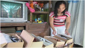 A single mom in the Philippines joined an FH savings group to start a small business of selling shoes