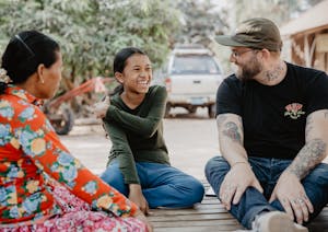 FH Creative Director Doug Penick meets sponsored child, Sopheap, in Cambodia.