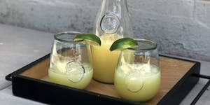 juice in glasses on a serving tray