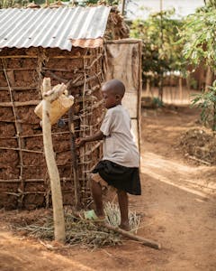 Child washing hands in Burundi