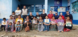 origins church team members alongside members of the community in Guatemala