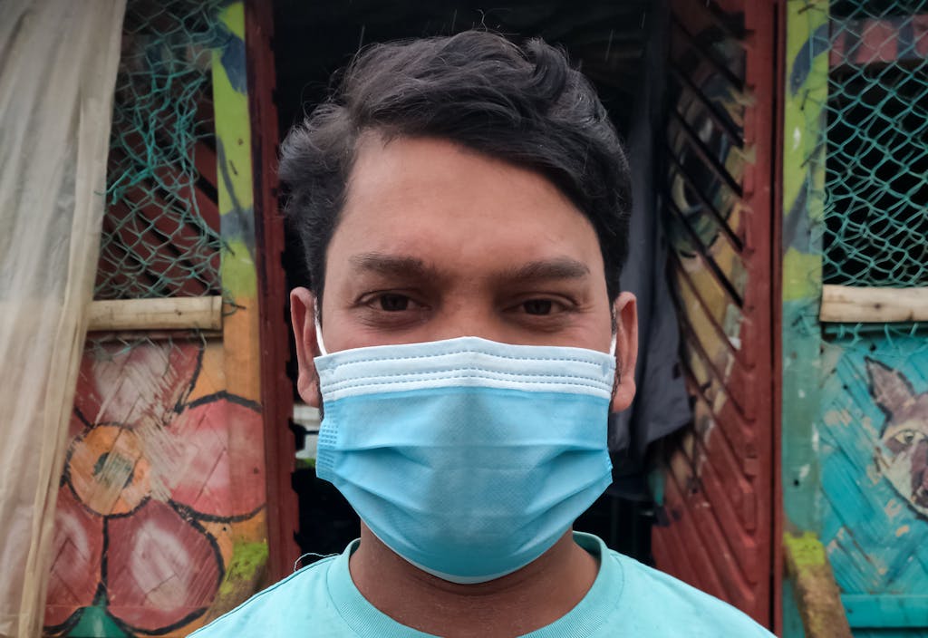 a man with a face mask on