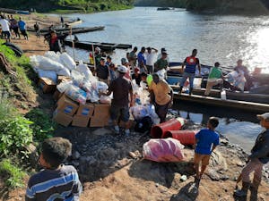 Unloading boats full of relief supplies in Nicaragua