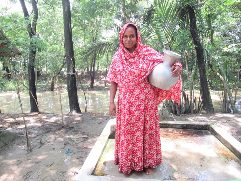 Instead of fetching unclean water from far away, Nargis Begum and her children can now access safe water in their own community for drinking, cleaning and, cooking.