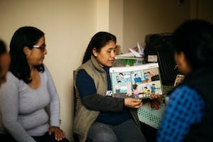 Cascade Group members in Peru share important messages with their neighbors.