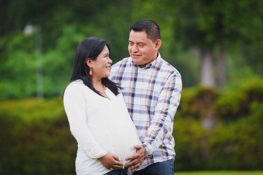 Pregnant woman and her husband, new parents