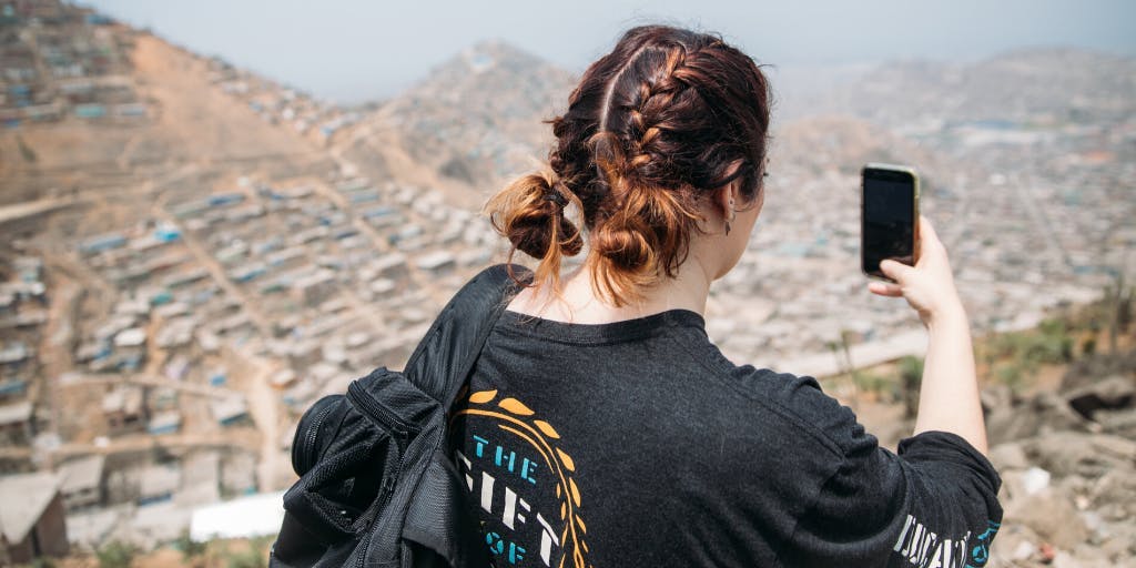 Jess takes a photo in Peru