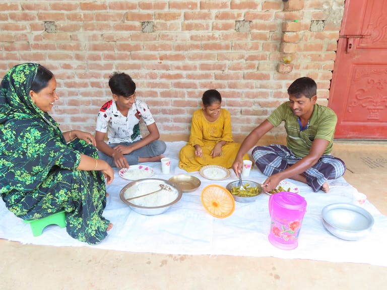 hey-are-very-happy-when-all-the-family-members-sit-together-for-lunch.