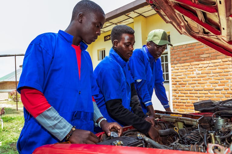 Leonard teaches other students at the vocational school.