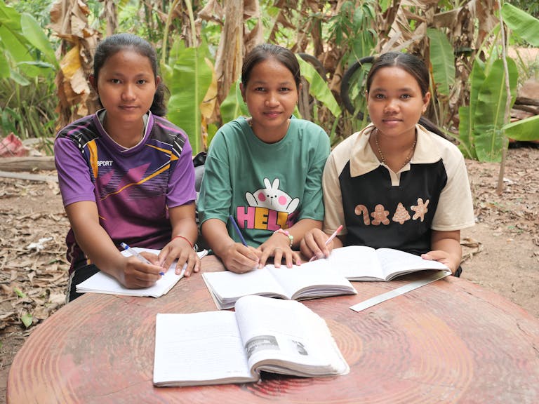 SreyMe and her fellow students studying and learning together.