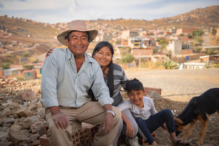 Maribel’s dad Pedro (pictured with Maribel and her nephew) is so proud of her. He encouraged her to open her own salon, helped her buy the tools she needed, hung mirrors, installed lights, and continues to champion her dreams.