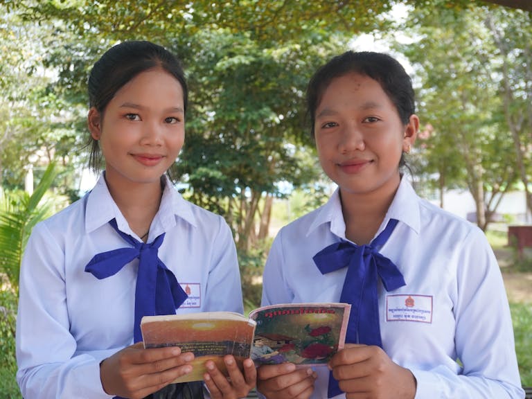 Romonea, 15, (left) says: I’m thankful for my friend Raksa. She helps me learn how to write and become an author. She always encourages me to read storybooks from our school program. Because of her, I now enjoy reading a lot! I’m also grateful to my mom. She loves me and the other kids so much. She always says kind and inspiring words and helps us study better.”