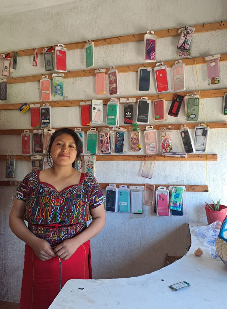 Rosa-with-her-cellphone-accessories-business-web