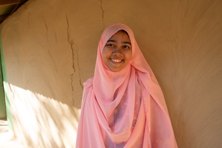 Umme lives in a community in Bangladesh where families face overwhelming challenges.